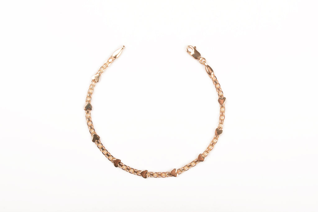 Pulsera de corazones sobre cadena fina